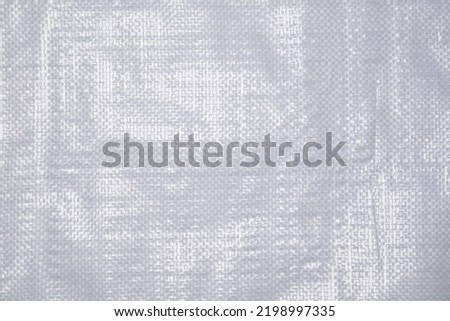 texture and pattern of plastic​ bag.Polypropylene sack cloth surface. Royalty-Free Stock Photo #2198997335