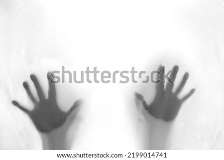 eerie blurry hands of people, ghost as if they have been trapped behind glass, fabric, wrap, spirit trying to reach out from afterlife, concept of violence, nightmares, halloween horror, friday 13th