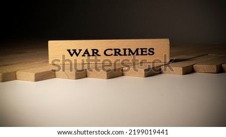war crimes written on wooden surface. Law and state.