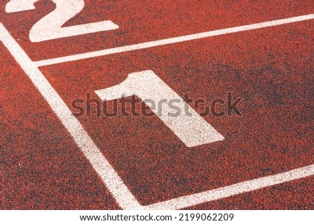 Running track in the stadium with the inscription "start 2023" The concept of the beginning of the new year