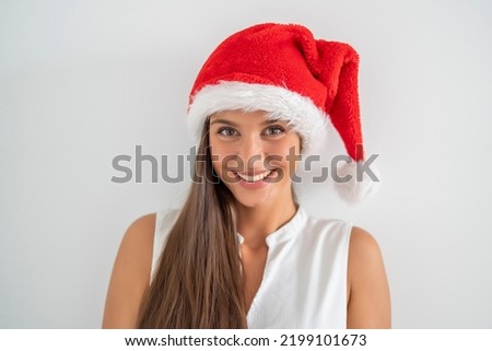 Smiling woman at christmas on a white background