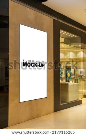 Perspective Mockup blank vertical advertising billboard at front of shop in shopping mall, empty space for insert your graphic announcement and advertisement promotion