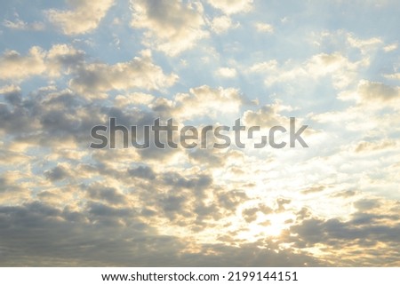 Vanilla sky with white clouds, beautiful cloudy background. Cirrocumulus, Altocumulus, Stratocumulus clouds on morning or evening sky Royalty-Free Stock Photo #2199144151