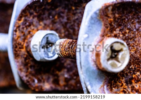 Rusty on screw (Old bolts and nut), Metal details, Macro photography. Closeup shot and selection focus. Royalty-Free Stock Photo #2199158219