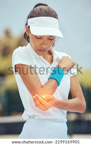 Tennis woman, elbow pain and abstract injury on sports court in wellness exercise, training and health workout. Fitness stress, burnout and medical emergency or arm accident for athlete in match game Royalty-Free Stock Photo #2199169905