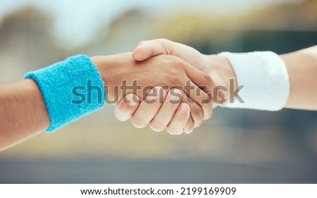 Handshake, teamwork and sport with the hands of sports people in collaboration outside after a game or match. Sportsmanship, fitness and exercise with friends playing or competing outdoors in the day Royalty-Free Stock Photo #2199169909