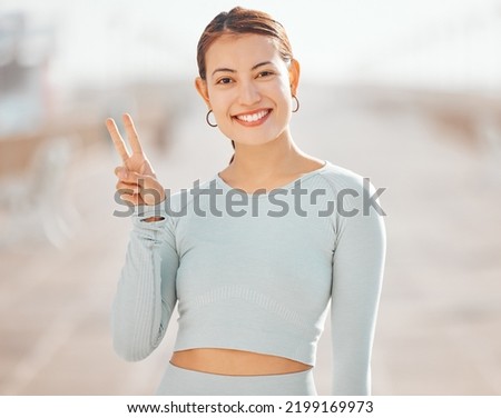 Peace sign hand, fitness woman or motivation for wellness health goals in exercise, training or sports workout. Happy smile portrait of personal trainer, cool gesture and athlete runner on background
