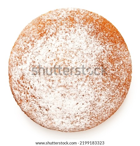 Whole lemon sponge cake with icing sugar topping isolated on white. Top view.