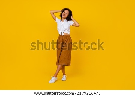 Full size photo of pretty nice lady wavy chevelure hairdo blank space make picture for banner isolated on yellow color background