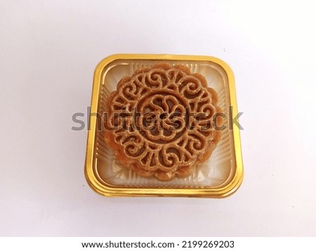 A mooncake is a Chinese bakery product traditionally eaten during the Mid-Autumn Festival.