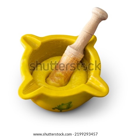 Mortar and pestle with freshly made "alioli" sauce isolated on an empty background Royalty-Free Stock Photo #2199293457