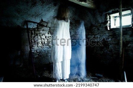 scary ghost in abandoned building at night Halloween background