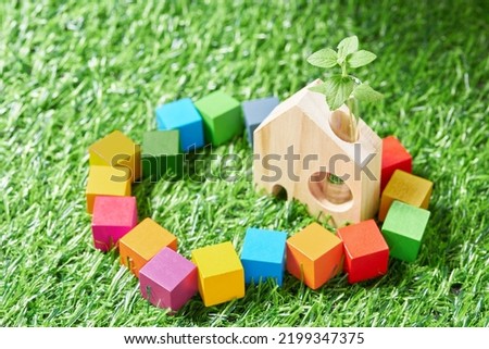 SDG symbols and a wooden cube  Royalty-Free Stock Photo #2199347375