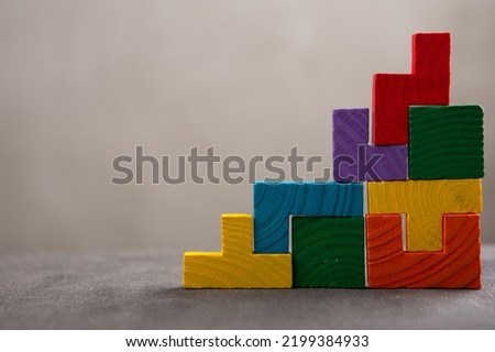 Creative idea solution - business concept, jigsaw puzzle close up. Leadership and teamwork strategy success. Royalty-Free Stock Photo #2199384933
