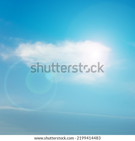 Clouds on blue sky with Sun
