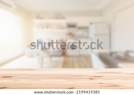 blur home indoor interior with wooden table space for living home appliances products advertising montage background.