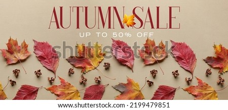 Banner for autumn sale with dry leaves on beige background