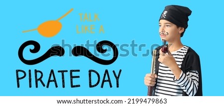Banner for Talk Like a Pirate Day with little boy on blue background