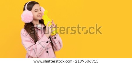 Beverage has never been this tasty. Happy child drink beverage product. Bottled water or juice. Horizontal poster of isolated child face, banner header, copy space. Royalty-Free Stock Photo #2199506915