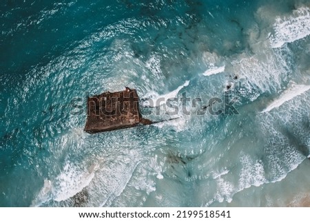 
Sunken ship in the ocean, drone view Royalty-Free Stock Photo #2199518541