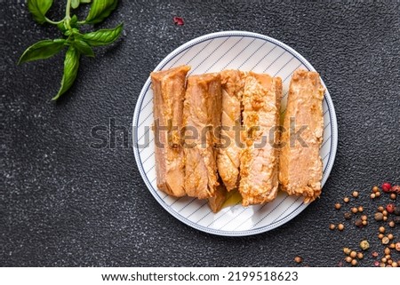 tuna canned fish in oil seafood healthy meal food snack diet on the table copy space food background rustic top view pescatarian diet Royalty-Free Stock Photo #2199518623