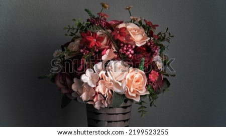 Bouquet of rustic style flower arrangement. Still life flower photography. Vintage concept of house plant. Royalty-Free Stock Photo #2199523255