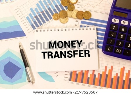 Hand writing the text: Money Transfer.
