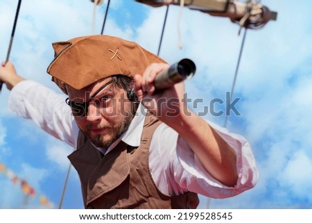 the pirate captain traveler  discoverer and explorer on the vintage pirate ship 