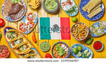 Mexican festive food for independence day independencia - around mexican flag. Top view , Yellow background Royalty-Free Stock Photo #2199546987