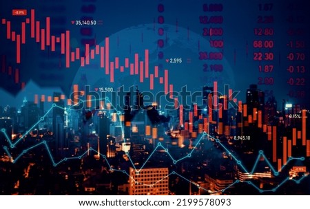 Economic crisis concept shown by declining graphs and digital indicators overlap modernistic city background. Double exposure. Royalty-Free Stock Photo #2199578093