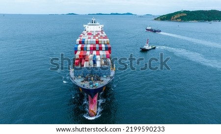 cargo container ship carrying container from custom container depot go to ocean concept freight shipping transportation by ship service logistics. Container ship with Tug Boat Front view. 