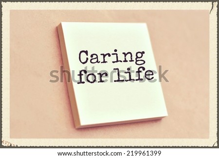 Text caring for life on the short note texture background