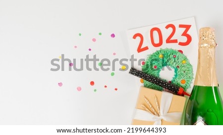 New Year's set - postcard, bottle of champagne, confetti, gift with ribbon, 2023