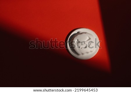 Gypsum figure of a Halloween pumpkin on a colored background