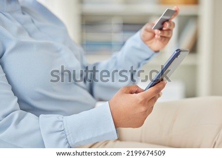 Business woman online shopping with a credit card and phone while on a break in corporate office. Closeup of a girl paying her mortgage, debt or financial bills with internet banking on a smartphone.