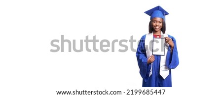 Banner. A university student in a graduation gown and hat, holding a diploma certificate in his hands, standing isolated on a white background. The concept of education. High quality photo