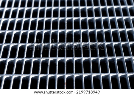 The texture of the steel grating is white.