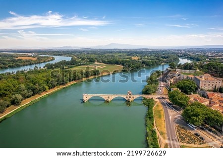 Drone aerial panoramic view of Pont Saint Benezet bridge and Rhone river  in Avignon. Avignon is a city on the Rhone river in southern France.