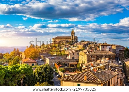 View of Montalcino town, Tuscany, Italy. Montalcino town takes its name from a variety of oak tree that once covered the terrain. View of the medieval Italian town of Montalcino. Tuscany Royalty-Free Stock Photo #2199735825