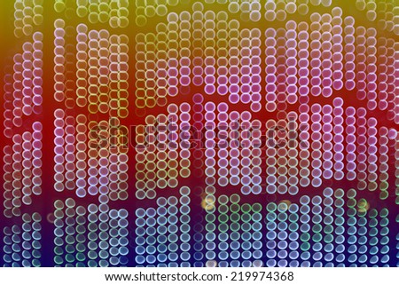 Abstract bokeh background of Christmas light on bright colors style.