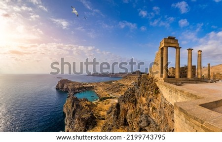 Ruins of Acropolis of Lindos view, Rhodes, Dodecanese Islands, Greek Islands, Greece. Acropolis of Lindos, ancient architecture of Rhodes, Greece.  Royalty-Free Stock Photo #2199743795