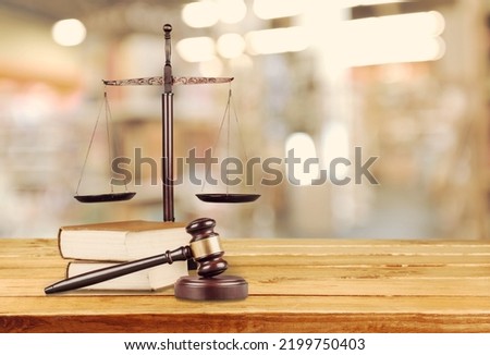 Legal office of lawyers, justice and law concept. Retro balance scale of justice on a desk in a courtroom Royalty-Free Stock Photo #2199750403