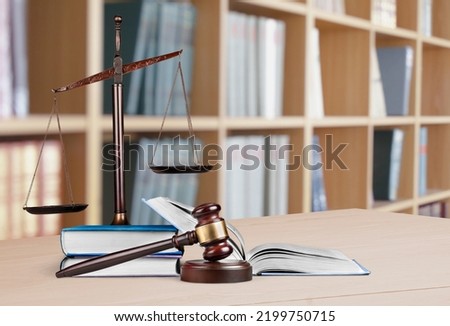 Legal office of lawyers, justice and law concept. Retro balance scale of justice on a desk in a courtroom Royalty-Free Stock Photo #2199750715