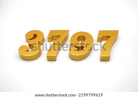  Number 3797 is made of gold-painted teak, 1 centimeter thick, placed on a white background to visualize it in 3D.                                