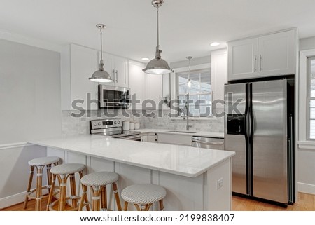 Luxury Modern Kitchen Interior Pendant Lights Royalty-Free Stock Photo #2199838407