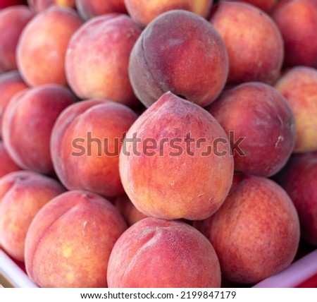 Peaches on the counter in the market. Close-up