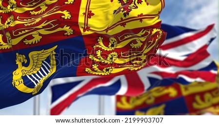 London, UK, September 2022: The Royal Standard of the United Kingdom waving the wind along with the UK flag Royalty-Free Stock Photo #2199903707