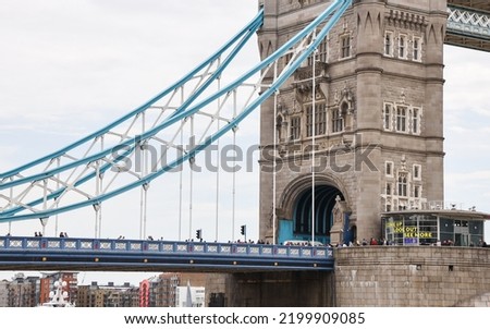Picture of London Bridge during the day time.