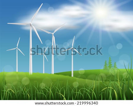 Windmills on the meadow on a background of sky and grass