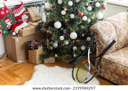 Tennis Christmas, Happy New Year concept with tennis, rocket. Winter sport healthy ornament